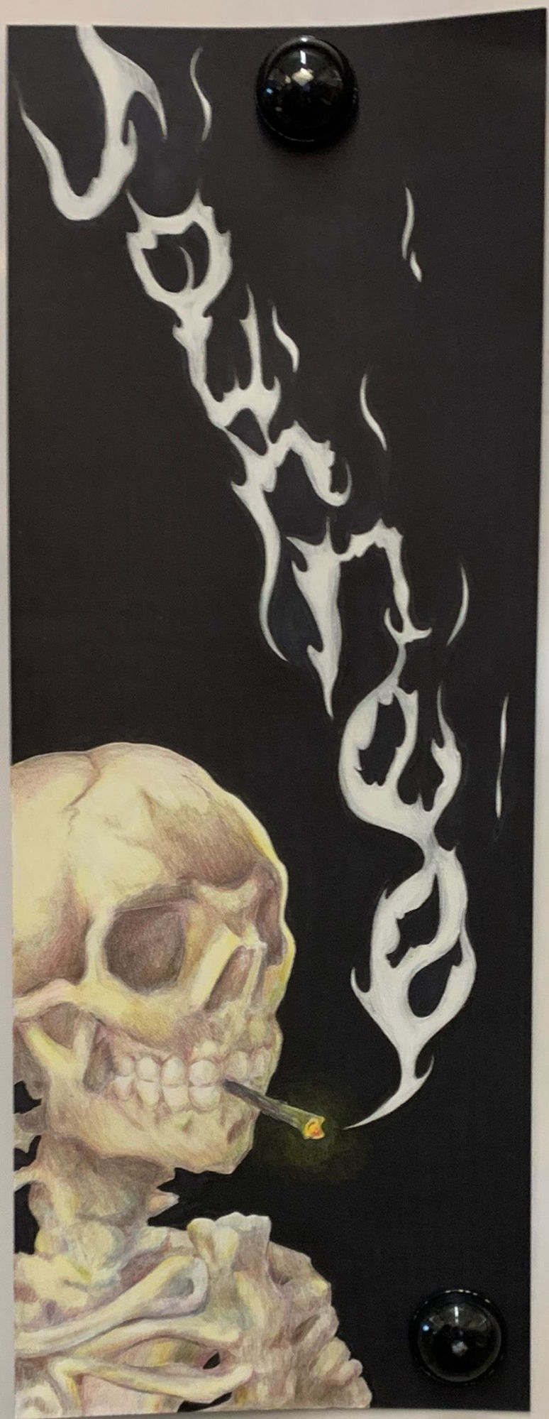 Colored pencil drawing of a skull with stylized white smoke on a black panel